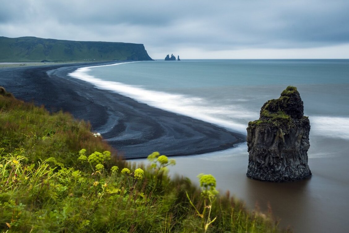 Reynisfjara Beach is the most famous black sanded beach in Iceland | Secret World Trip Planner