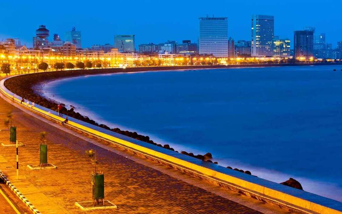 Marine Drive is a 4 km long promenade located in South Bombay. One of the most b - Mumbai | Secret World Trip Planner