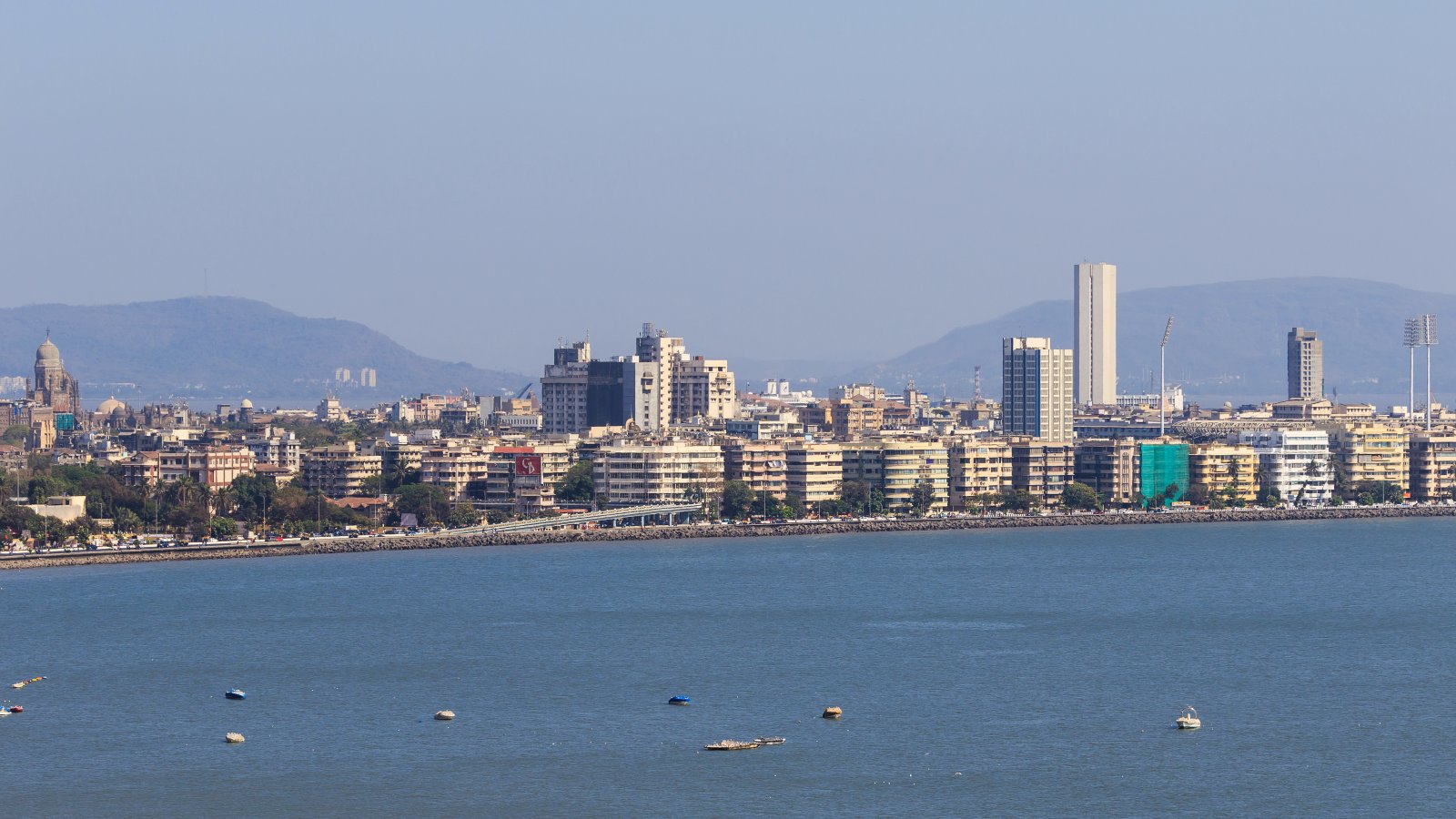 Marine Drive is a 4 km long promenade located in South Bombay. One of the most b - Mumbai | Secret World Trip Planner