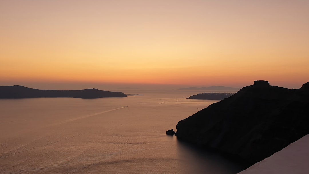 Dreamy Sunsets in Santorini: The Magic of Oía - Nik. Nomikou | Secret World Trip Planner