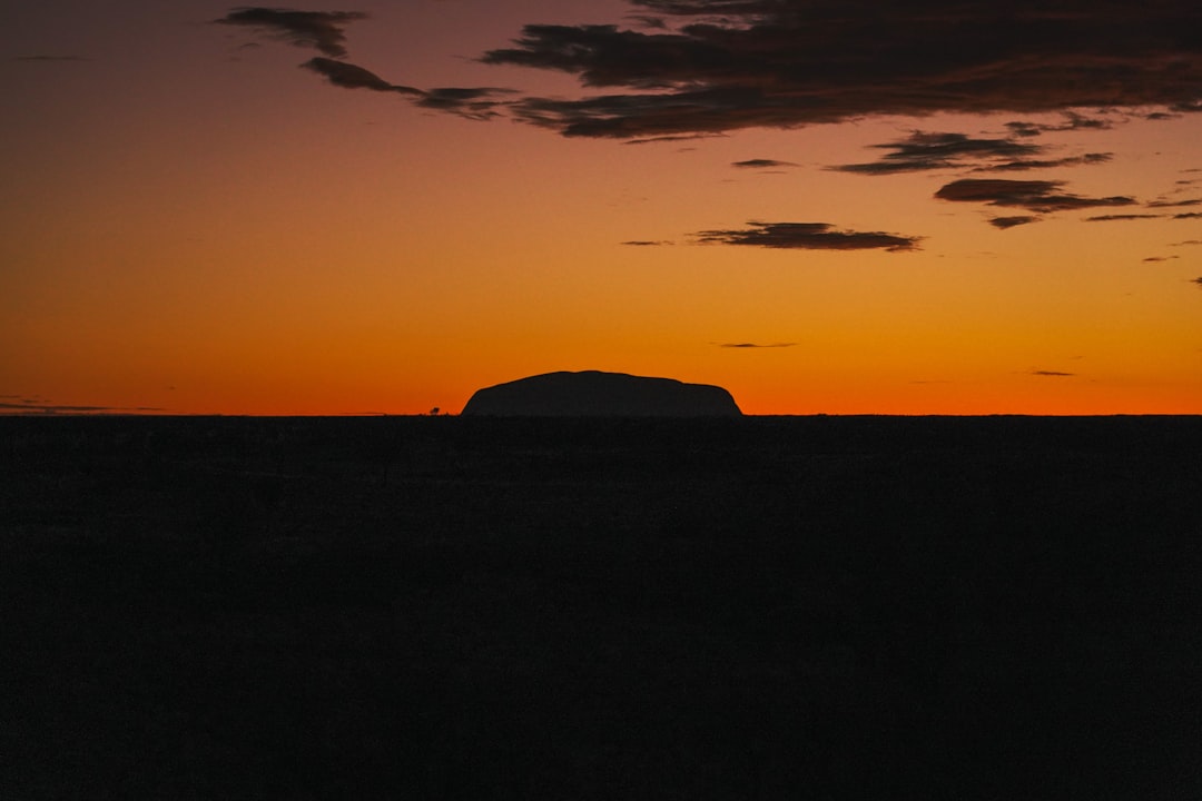 Uluru: The Fiery Trunk at Sunset - Mutitjulu NT 0872 | Secret World Trip Planner