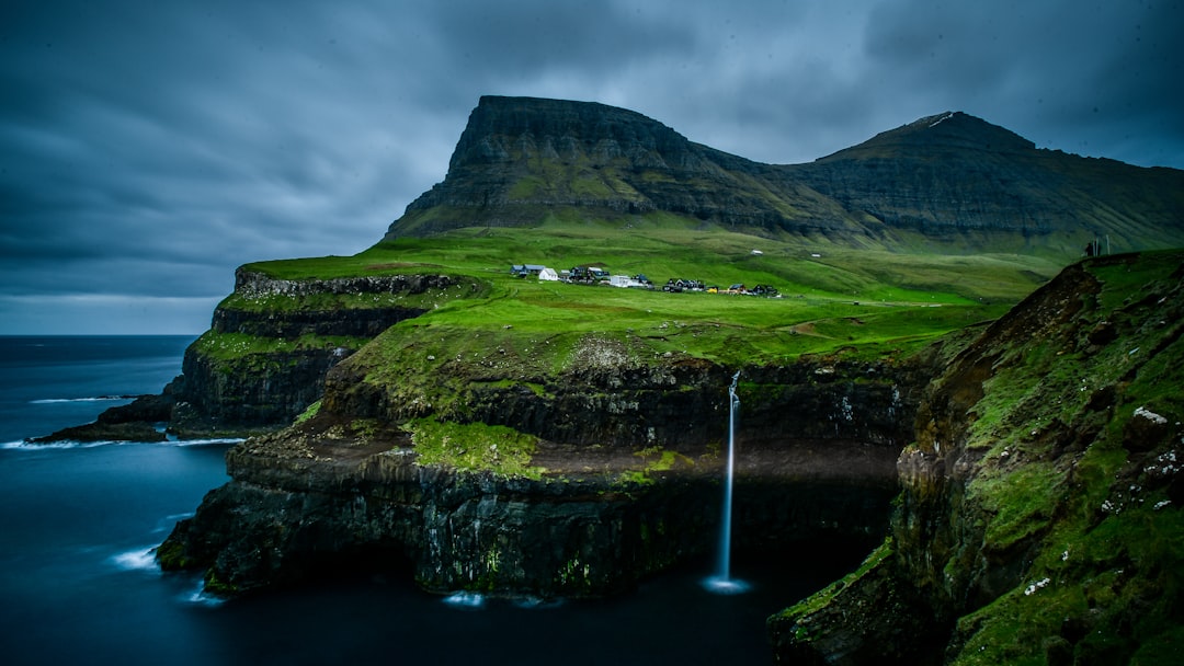 Gásadalur: Sunset Over the Faroe Waterfall - 4H47+CXP | Secret World Trip Planner